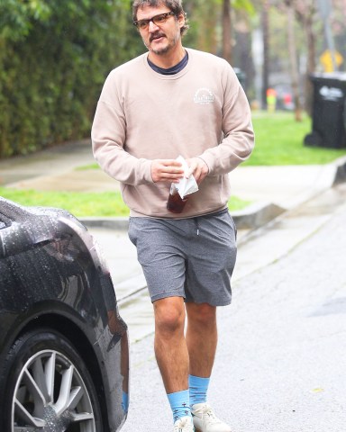 Los Angeles, CA  - *EXCLUSIVE*  - 'The Last of Us' star Pedro Pascal is seen leaving a private gym session where he is asked how many shots of espresso did he drink prior to working out, he replies: TWELVE! The Mandalorian star was referring to his recent viral moment in which eagle eyed fans caught up with him after a starbucks run and saw his drink order, 7 espresso shots over ice!

Pictured: Pedro Pascal

BACKGRID USA 15 MARCH 2023 

USA: +1 310 798 9111 / usasales@backgrid.com

UK: +44 208 344 2007 / uksales@backgrid.com

*UK Clients - Pictures Containing Children
Please Pixelate Face Prior To Publication*