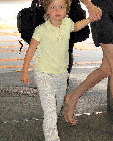 Shiloh Jolie-Pitt
Angelina Jolie at Narita International Airport, Tokyo, Japan - 26 Jul 2010
Angelina Jolie in Japan to promote film 'Salt'