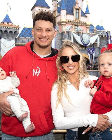 MVP Patrick Mahomes of the Kansas City Chiefs poses with his wife, Brittney Mahomes, their children, Sterling, 1, and Bronze, 11 weeks old, in front of Sleeping Beauty Castle at Disneyland Park in Anaheim, Calif., Feb. 13, 2023. Mahomes visited the Disneyland Resort during the Disney100 Celebration less than 24 hours after the Kansas City Chiefs victory over the Philadelphia Eagles in Super Bowl LVII. (Christian Thompson/Disneyland Resort)
MVP Patrick Mahomes Celebrates Super Bowl LVII Win with First Family Visit to Disneyland Resort, Anaheim, CA, USA - 13 Feb 2023