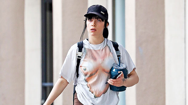 Billie Eilish wears Wild 'Topless' bike t-shirt and shorts as she heads to the gym: photos