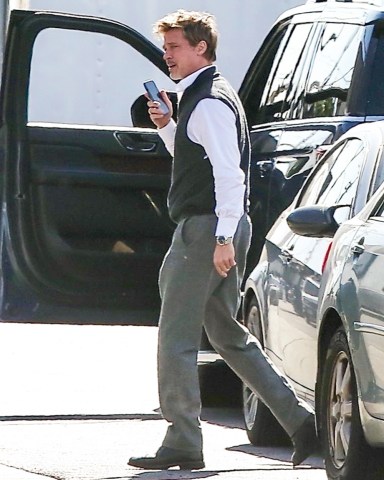 Los Angeles, CA  - *EXCLUSIVE*  - Brad Pitt takes a call as he arrives on the set of 'Wolves' in Los Angeles amid Gwyneth Paltrow commenting on her previous relationships and how he was in bed.Pictured: Brad PittBACKGRID USA 3 MAY 2023 BYLINE MUST READ: BACKGRIDUSA: +1 310 798 9111 / usasales@backgrid.comUK: +44 208 344 2007 / uksales@backgrid.com*UK Clients - Pictures Containing ChildrenPlease Pixelate Face Prior To Publication*