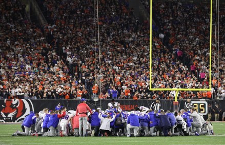 The Buffalo Bills pray on the field after Bills Damar Hamlin (3) was injured making a tackle against the Cincinnati Bengals during the first half of play at Paycor Stadium on Monday, January 2, 2023 in Louisville, Kentucky.  Bengals Bills, Cincinnati, Ohio, United States - 02 Jan 2023