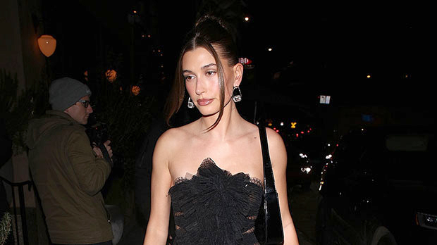 Hailey Bieber Stuns In Strapless Cutout Mini Dress & Stockings With Justin Bieber At Lori Harvey’s Party