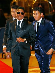 Jermaine Jackson, Jaafar Jackson, Jermajesty Jackson U.S. singer Jermaine Jackson, center, and his two sons, Jaafar, left, and Jermajesty, walk on the red carpet upon their arrival for the Asian Film Awards in Macau
Macau Asian Film Awards