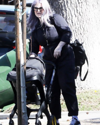 Los Angeles, CA  - *EXCLUSIVE*  - Kelly Osbourne is getting all the help she can get as she steps out with newborn baby Sidney in Los Angeles. Kelly has a friend who helped load Sidney's car seat in Kelly's ride after she attended a newborn baby support group.

Pictured: Kelly Osbourne

BACKGRID USA 15 FEBRUARY 2023 

BYLINE MUST READ: Stefan / BACKGRID

USA: +1 310 798 9111 / usasales@backgrid.com

UK: +44 208 344 2007 / uksales@backgrid.com

*UK Clients - Pictures Containing Children
Please Pixelate Face Prior To Publication*