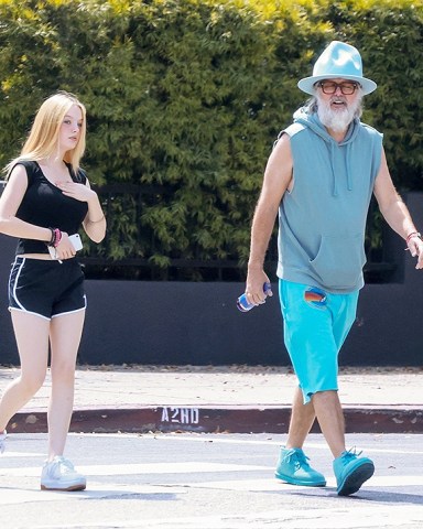 Los Feliz, CA  - *EXCLUSIVE*  - Michael Lockwood wears a colorful outfit as he walks to lunch with his daughter in Los Feliz.

Pictured: Michael Lockwood

BACKGRID USA 11 APRIL 2023 

USA: +1 310 798 9111 / usasales@backgrid.com

UK: +44 208 344 2007 / uksales@backgrid.com

*UK Clients - Pictures Containing Children
Please Pixelate Face Prior To Publication*