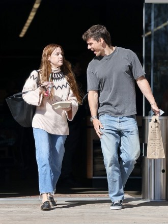 Los Angeles, CA - *EXCLUSIVE* - Riley Keough and her husband Ben Smith-Petersen are seen making a run to trendy Erewhon in Los Angeles.  Riley Keough "is disappointed" that Priscilla Presley is challenging Lisa Marie Presley's trust.  A source told ET that Riley feels that Priscilla's challenge to the late Lisa Marie's will go against "her mom's wishes.""Riley wants to keep the family together and keep Lisa Marie's legacy in a positive light, but she feels that her grandmother's actions are pushing the family apart even more," the source says. "It's upsetting to her as she wants to have a relationship with Priscilla, but at this point in time they are not close."As for Lisa Marie, the source says that she "did not have a healthy or close relationship" with Priscilla prior to her death, adding that things were "very complicated" between them."Lisa Marie was struggling, and it definitely put a strain on her relationship with her mother," the source says. "Lisa Marie always felt Priscilla was trying to have control over her."Given that, the source says that Lisa Marie "always meant for her children to inherit her trust." Lisa Marie was also mom to Benjamin, who died in July 2020."Lisa always wanted Riley and Benjamin to be the beneficiaries of the trust and that was no secret," the source says, adding that the late singer's "Children meant the world to her, and she would do anything for them."Pictured: Riley Keough, Ben Smith BACKGRID USA 13 FEBRUARY 2023 USA: +1 310 798 9111 / usasales@backgrid.com UK: +44 208 344 2007 / uksales@backgrid.com *UK Clients - Pictures Containing Children Please Pixelate Face Prior To Publication*