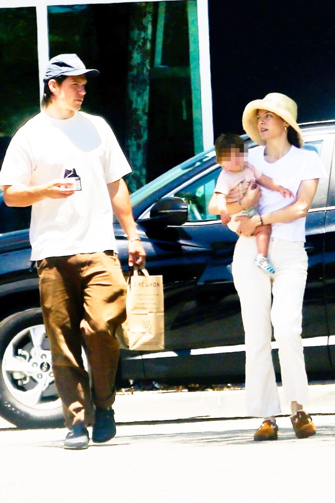 Riley Keough & her husband with their daughter