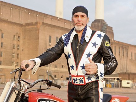 Robbie Knievel in front of Battersea Power Station
Robbie Knievel announces plans to stage a record attempt jump, Battersea Power Station, London, Britain - 15 Dec 2009
Robbie Knievel, the son of daredevil rider Evel Knievel, has announced plans to attempt a record that his father was never able to complete. In May 2010, at Battersea Power Station in London, Robbie will attempt to jump across an incredible 16 double-decker buses. He will make the attempt on a classic Harley Davidson XR-750, the same make and model his father used to ride. In 1975 Evel Knievel made a similar jump at Wembley Stadium, trying to jump 13 buses. However, the stunt went wrong and he crashed, breaking his pelvis in front of 90,000 fans. Evel was 37 at the time – his son Robbie is 47. The current record for jumping a Harley-Davidson XR-750 is 15 buses, held by American Bubba Blackwell. Throughout his career Robbie has completed over 250 jumps, setting 20 world records