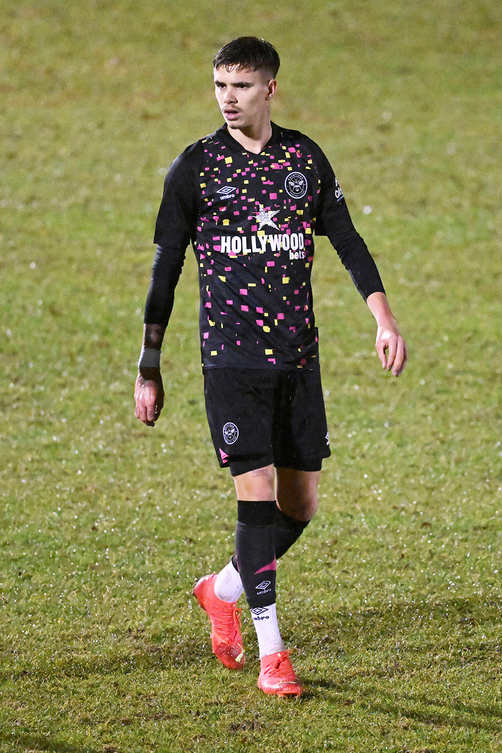 Romeo Beckham is seen making his debut for Brentford B's team against Erith & Belvedere's in Bexley whilst his proud father David Beckham watches from the sidelines and is mobbed by fans