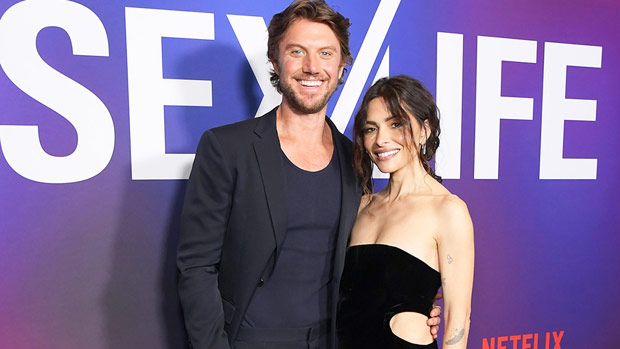 Adam Demos & Sarah Shahi Prove They’re Going Strong As They Cozy Up At Premiere Of ‘Sex/Life’ Season 2