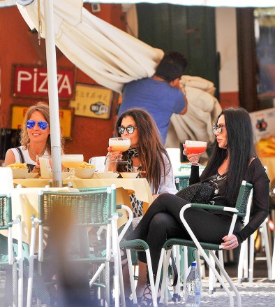 ** RESTRICTIONS: ONLY UNITED STATES, BRAZIL, CANADA ** Portofino, Italy - Portofino, Italy - Goddess of Pop, Cher enjoys a relaxing vacation with friends in Portofino, Italy. The singer and actress enjoyed a strawberry margarita with girlfriends before meeting up with others for an ice cream snack. AKM-GSI 21 JUNE 2016 To License These Photos, Please Contact : Maria Buda (917) 242-1505 mbuda@akmgsi.comor  Mark Satter (317) 691-9592 msatter@akmgsi.com sales@akmgsi.com