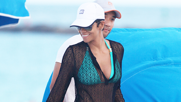 Halle Berry, 56, wears a black bikini as she shows off her makeup-free mirror selfie