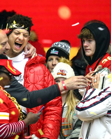 Brittany Mahomes, right, keeps the silver football her husband, Patrick Mahomes, laughing, was carrying, away from Kansas City Chiefs quarterback coach Matt Nagy left, during the Kansas City Chiefs' victory celebration and parade in Kansas City, Mo., . The Chiefs defeated the Philadelphia Eagles in the NFL Super Bowl 57 football game
Super Bowl Chiefs Parade Football, Kansas City, United States - 15 Feb 2023