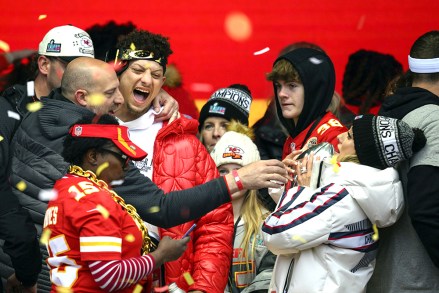 Brittany Mahomes, right, keeps the silver football her husband, Patrick Mahomes, laughing, was carrying, away from Kansas City Chiefs quarterback coach Matt Nagy left, during the Kansas City Chiefs' victory celebration and parade in Kansas City, Mo., . The Chiefs defeated the Philadelphia Eagles in the NFL Super Bowl 57 football game
Super Bowl Chiefs Parade Football, Kansas City, United States - 15 Feb 2023