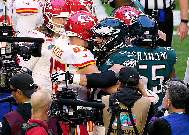 Travis and Jason Kelce Share Hug on the Super Bowl Field