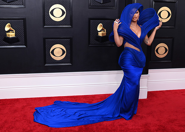 Cardi B wears a VERY revealing low-cut dress to pre-Grammy gala