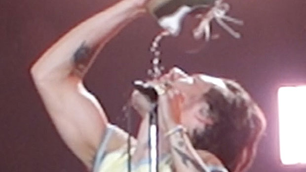 Harry Styles Drinks Out Of A Shoe At Australia Concert: It’s A ‘Disgusting Tradition’
