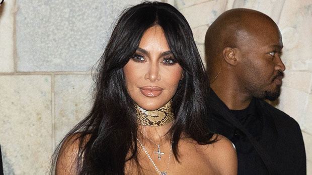 Kim Kardashian Stuns In Lace-Up Snakeskin Dress At Milan Fashion