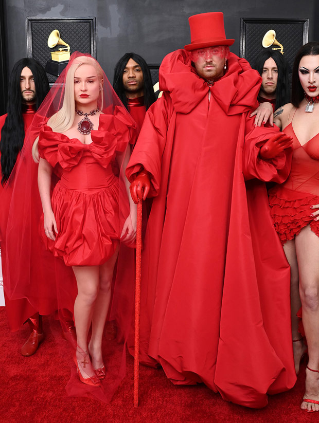 Sam Smith Wows In A Monochromatic Red Gown & Top Hat At Grammys Photos