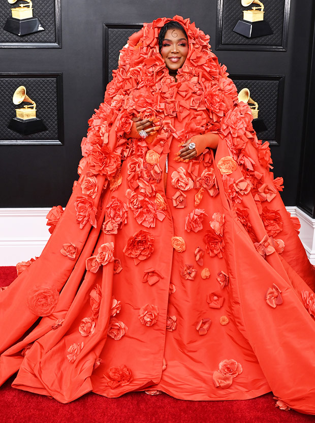 Lizzo Celebrates in Silver Dress & Flower Heels at Grammy Awards 2023