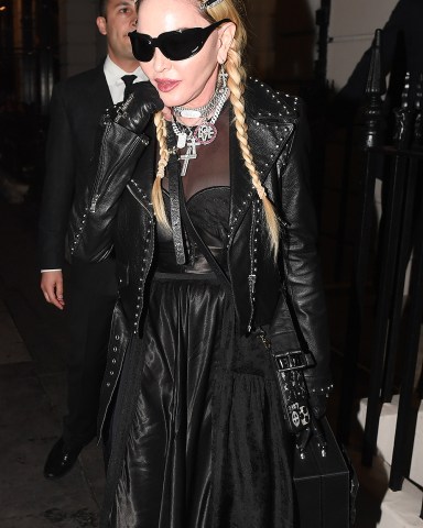 Madonna seen leaving Oswald's Private Members club in soho after partying with FKA Twigs. Madonna was seen flashing her endless bling as she stepped out dripped in Jewellery. Madonna was seen flashing a diamond M ring as she left the members club in dark shades. Pictured: Madonna Ref: SPL5313761 250522 NON-EXCLUSIVE Picture by: SplashNews.com Splash News and Pictures USA: +1 310-525-5808 London: +44 (0)20 8126 1009 Berlin: +49 175 3764 166 photodesk@splashnews.com World Rights