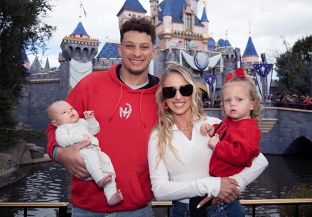 MVP Patrick Mahomes of the Kansas City Chiefs poses with his wife Brittney Mahomes, their children Sterling, 1, and Bronze, 11 weeks old, in front of Sleeping Beauty Castle at Disneyland Park in Anaheim, California, February 13, 2023 Mahomes visited the Disneyland Resort during the Disney100 Celebration less than 24 hours after the Kansas City Chiefs' victory over the Philadelphia Eagles in Super Bowl LVII.  (Christian Thompson/Disneyland Resort) MVP Patrick Mahomes celebrates Super Bowl LVII victory with first family visit to Disneyland Resort, Anaheim, CA, USA - February 13, 2023