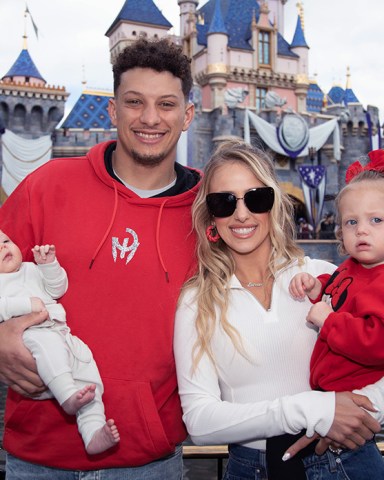 MVP Patrick Mahomes of the Kansas City Chiefs poses with his wife, Brittney Mahomes, their children, Sterling, 1, and Bronze, 11 weeks old, in front of Sleeping Beauty Castle at Disneyland Park in Anaheim, Calif., Feb. 13, 2023. Mahomes visited the Disneyland Resort during the Disney100 Celebration less than 24 hours after the Kansas City Chiefs victory over the Philadelphia Eagles in Super Bowl LVII. (Christian Thompson/Disneyland Resort)
MVP Patrick Mahomes Celebrates Super Bowl LVII Win with First Family Visit to Disneyland Resort, Anaheim, CA, USA - 13 Feb 2023