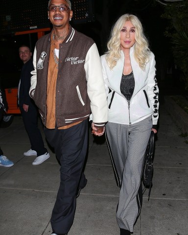 Beverly Hills, CA - *EXCLUSIVE* Cher and Alexander Edwards arrive hand in hand for a pre-Grammy party at Matsuhisa restaurant in Beverly Hills. Pictured: Cher, Alexander Edwards BACKGRID USA 3 FEBRUARY 2023 BYLINE MUST READ: The Hollywood JR / BACKGRID USA: +1 310 798 9111 / usasales@backgrid.com UK: +44 208 344 2007 / uksales@backgrid.com *UK Clients - Pictures Containing Children Please Pixelate Face Prior To Publication*