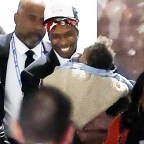 *EXCLUSIVE* ASAP Rocky holds onto his baby while sharing laughs with Jay Z leaving the Super Bowl!