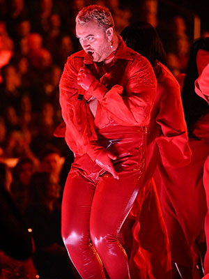 Sam Smith At Grammys 2023 In Red Gown Top Hat Plus