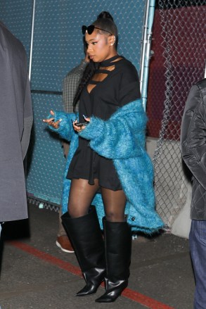 Phoenix, AZ - *EXCLUSIVE* - Jennifer Hudson cuts a stylish figure in a black dress paired with a blue sweater and black boots as she exits the Super Bowl Pictured: Jennifer Hudson BACKGRID USA 12 FEBRUARY 2023 BYLINE MUST READ: The Daily Stardust / BACKGRID USA: +1 310 798 9111 / usasales@backgrid.com UK: +44 208 344 2007 / uksales@backgrid.com *UK Clients - Pictures Containing Children Please Pixelate Face Prior To Publication*