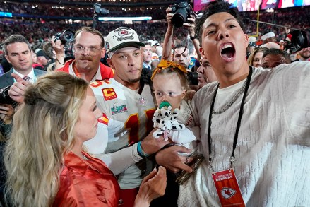 Kansas City Chiefs quarterback Patrick Mahomes, middle, and his wife Brittany, left, celebrate with their daughter, Sterling Skye Mahomes, and Jackson Mahomes after the NFL Super Bowl 57 football game, in Glendale, Ariz.  The Kansas City Chiefs defeated the Philadelphia Eagles 38-35 Super Bowl Football, Glendale, United States - 12 Feb 2023