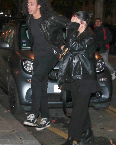 Cole Tucker and Vanessa Hudgens are seen arriving at their hotel in Paris. 13 Nov 2022 Pictured: Cole Tucker Vanessa Hudgens. Photo credit: Spread Pictures / MEGA TheMegaAgency.com +1 888 505 6342 (Mega Agency TagID: MEGA917589_006.jpg) [Photo via Mega Agency]