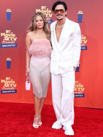 In this image released on June 5, American actress Ariana Madix and actor Tom Sandoval arrive at the 2022 MTV Movie And TV Awards: UNSCRIPTED held at The Barker Hangar in Santa Monica, Los Angeles, California, United States.
2022 MTV Movie And TV Awards: UNSCRIPTED, The Barker Hangar, Santa Monica, Los Angeles, California, United States - 06 Jun 2022