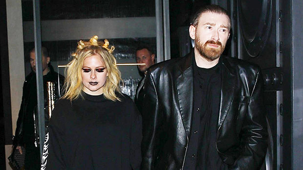 Avril Lavigne & Guram Gvasalia Hold Hands At Paris Fashion Week Amid Romance Rumors With Tyga