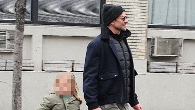Bradley Cooper sweetly holds hands with daughter Lea, 6, as they enjoy an  after-school ice cream run in NYC