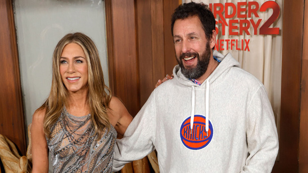 Jennifer Aniston mocks Adam Sandler’s casual look at the ‘Murder Mystery 2’ premiere.