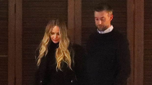 Jennifer Lawrence wears a pink skirt and high boots for a date night ...