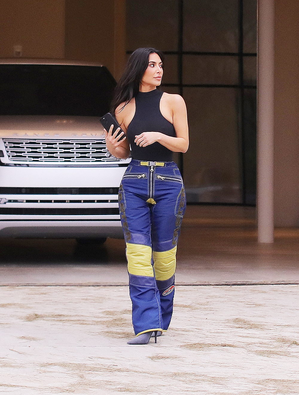 EXCLUSIVE: Kim Kardashian takes a call outside her offices at Calabasas, California