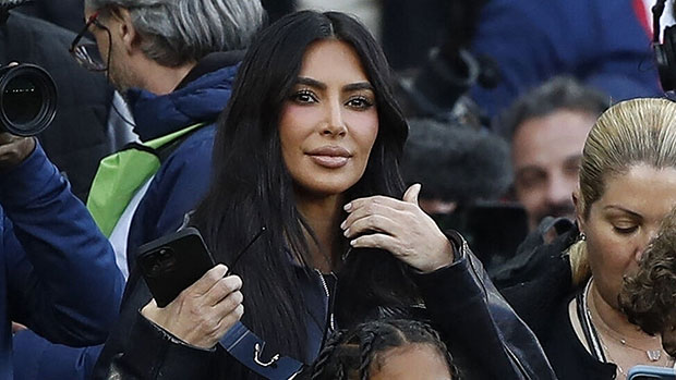 Kim Kardashian and Son Saint, 7, cheer on a football match in Paris after attending a game in London: photos