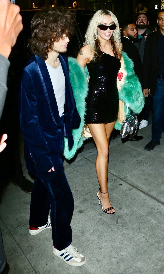 Miley Cyrus & Maxx Morando At Gucci