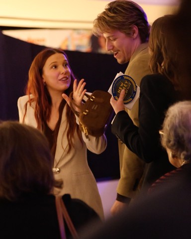 EAST RUTHERFORD, NJ - NOVEMBER 21: Millie Bobby Brown and Jake Bongiovi attend the New Jersey Hall Of Fame Induction Ceremony at American Dream on November 21, 2025 in East Rutherford, New Jersey.  (Photo by Jose Perez/Bauer-Griffin/Getty Images)