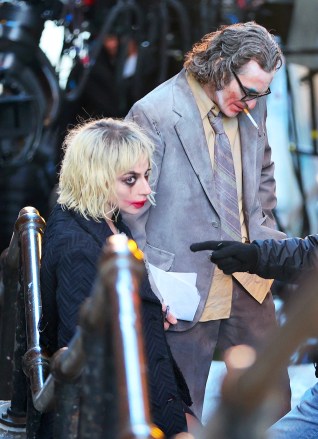 Director Todd Phillips , Lady Gaga and Joaquin Phoenix pictured in their full make up filming at the ‚ÄúJoker: Folie a Deux‚Äù set at the Shakespeare Stairs in the Bronx.Pictured: Lady Gaga and Joaquin PhoenixRef: SPL5535091 030423 NON-EXCLUSIVEPicture by: Jose Perez / SplashNews.comSplash News and PicturesUSA: +1 310-525-5808London: +44 (0)20 8126 1009Berlin: +49 175 3764 166photodesk@splashnews.comWorld Rights