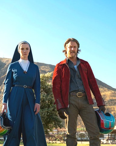 MRS. DAVIS -- "Mother of Mercy: The Call of the Horse" Episode 101 -- Pictured: (l-r) Betty Gilpin as Simone, Jake McDorman as Wiley -- (Photo by: Colleen Hayes/Peacock)