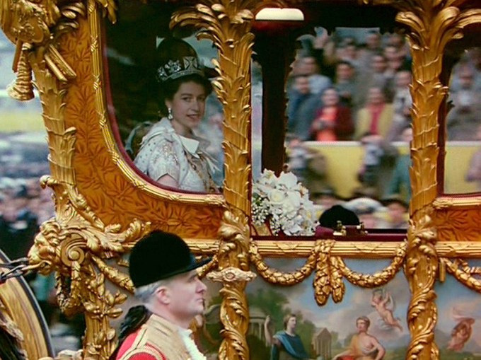 Queen Elizabeth Rides In The Stagecoach Following Her Coronation