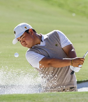 Tom Kim, of South Korea, hits out of a bunker on the 12th hole at the Presidents Cup golf championship in Charlotte, North Carolina on Saturday, September 24, 2022.
President's Cup Golf Championship in Charlotte, Nc, North Carolina, United States - 24 Sep 2022