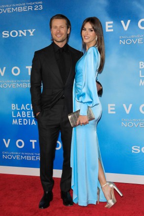 Glen Powell and model Gigi Paris at the premiere of Devotion at the Regency Village Theatre in Los Angeles, California, USA, 15 November 2022. The movie will be released in theaters on 23 November 2022.
Premiere of Devotion, Los Angeles, USA - 15 Nov 2022