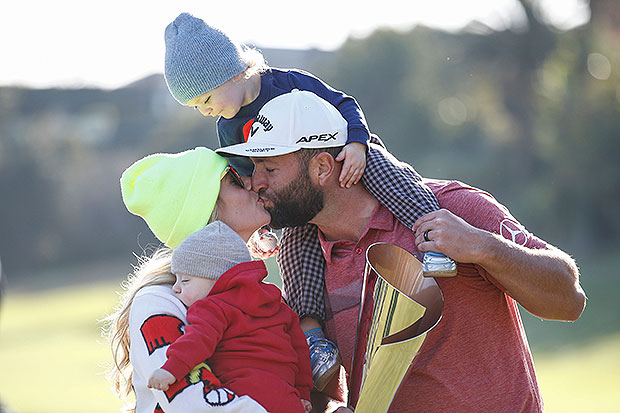 Jon Rahm kisses wife Kelley Cahill after winning 2023 Masters