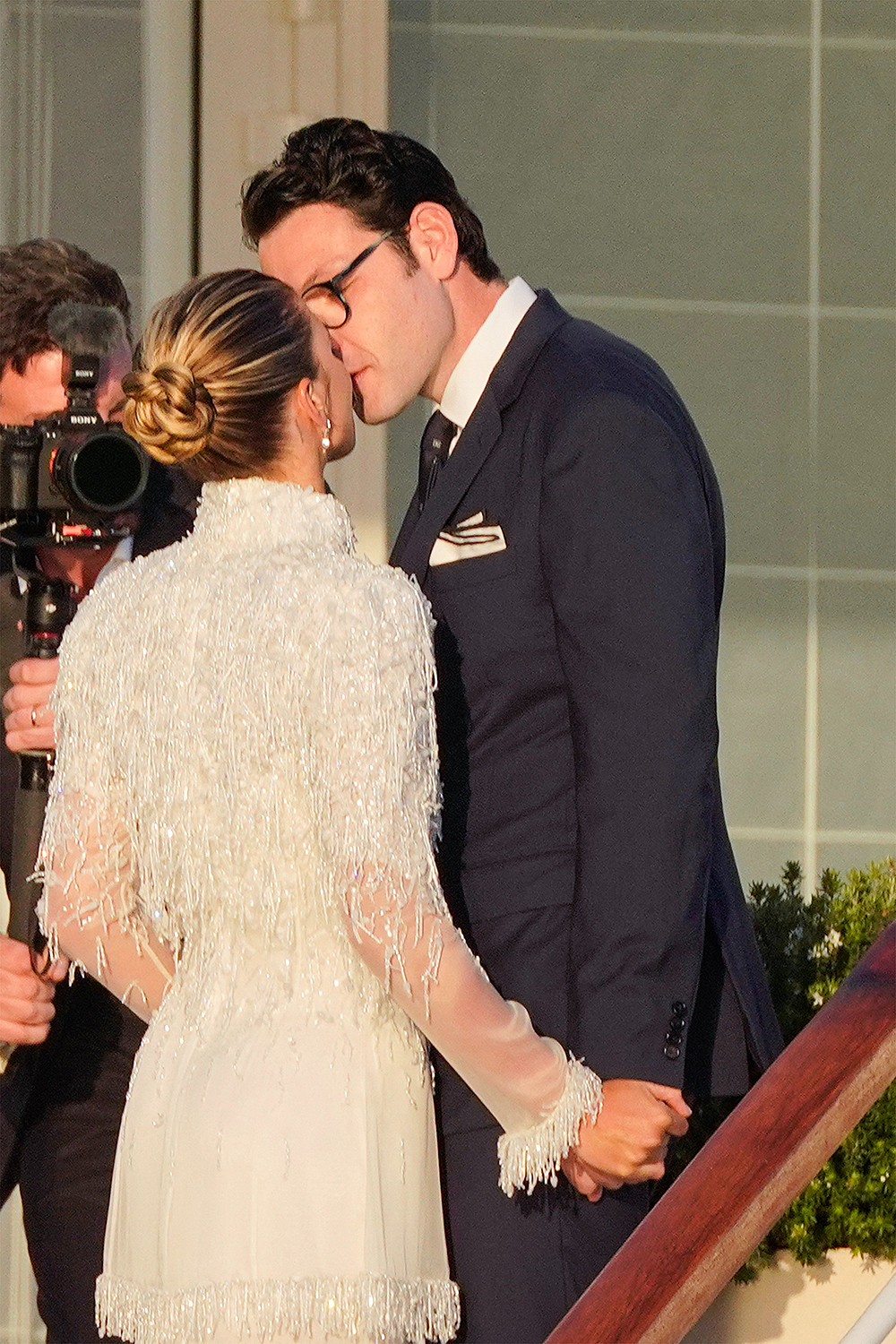 Blushing bride Sofia Richie looks radiant in an elegant white gown as she celebrates her lavish wedding weekend in the French Riviera.